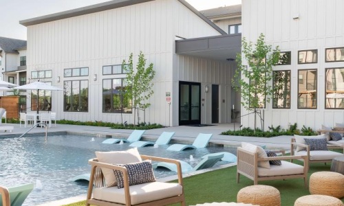 a large house with a pool